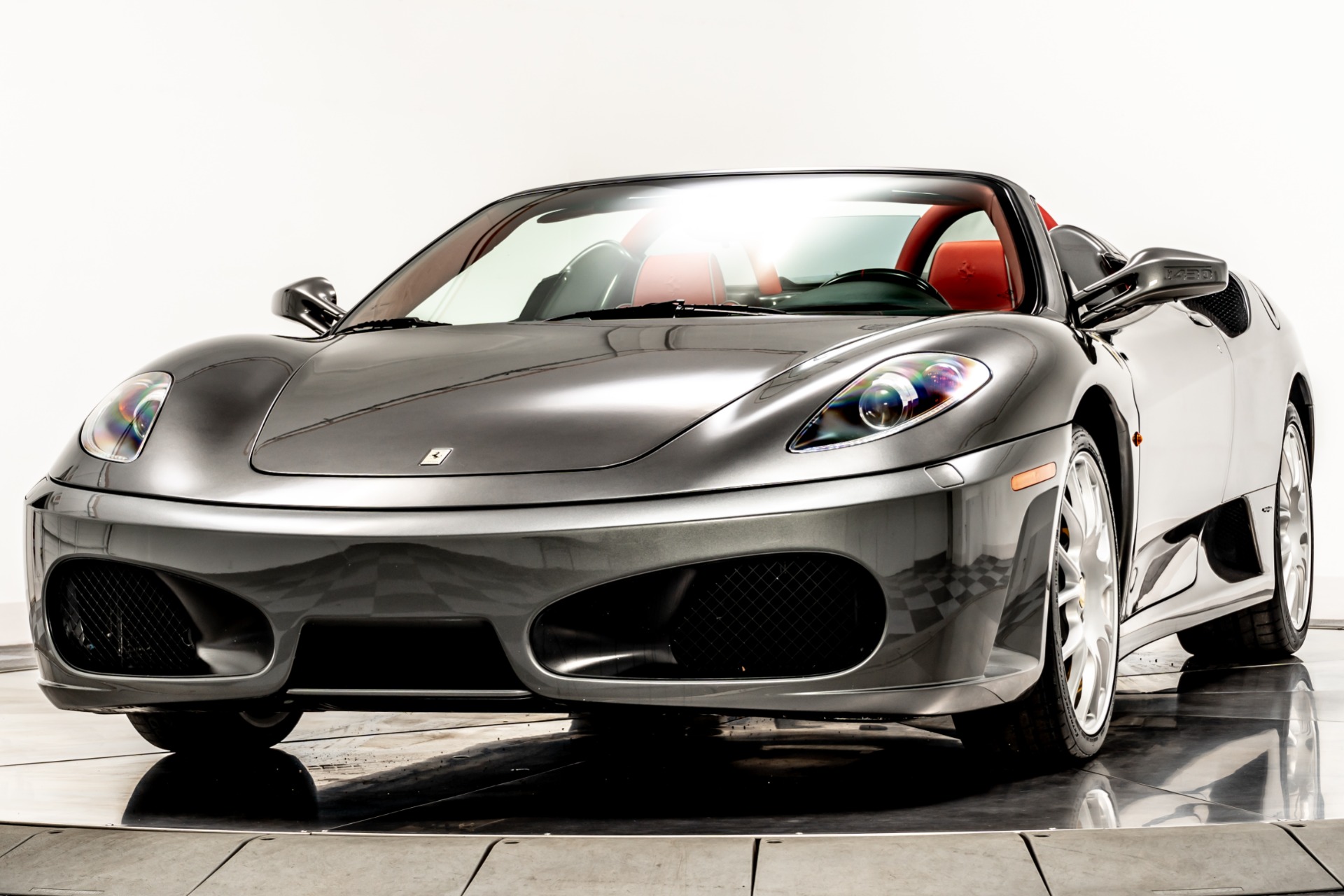 Grigio Silverstone Ferrari F430 Spider with Rosso Interior For