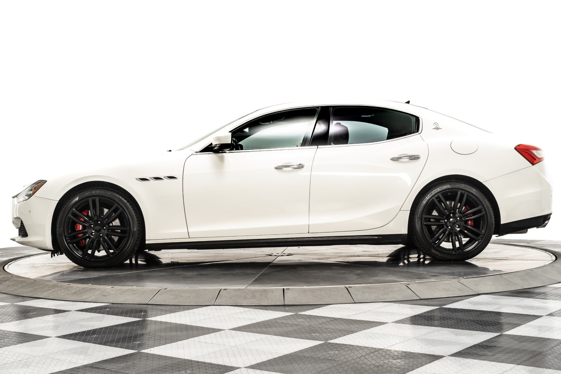 Bianco Alpi Maserati Ghibli S Q4 with Rosso Trofeo Interior For