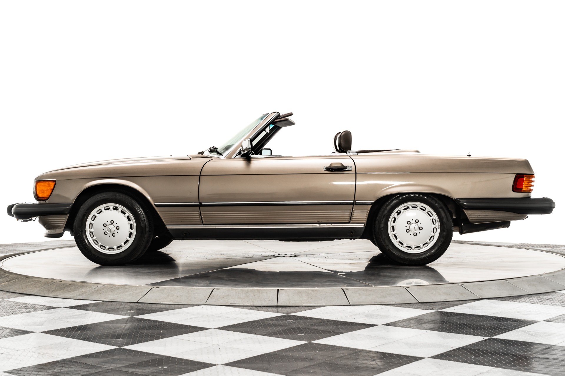 Desert Taupe Mercedes-Benz 560 SL with Dark Brown Leather Interior