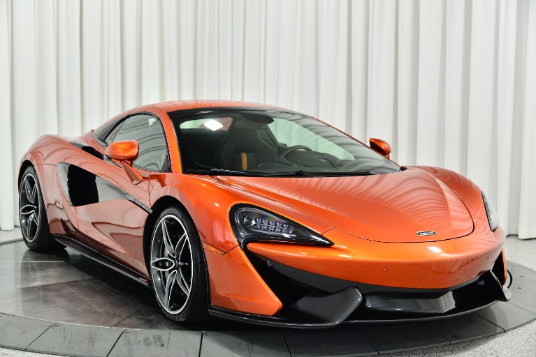 Volcano Orange McLaren 570S Spider with Carbon Black/Jet Black