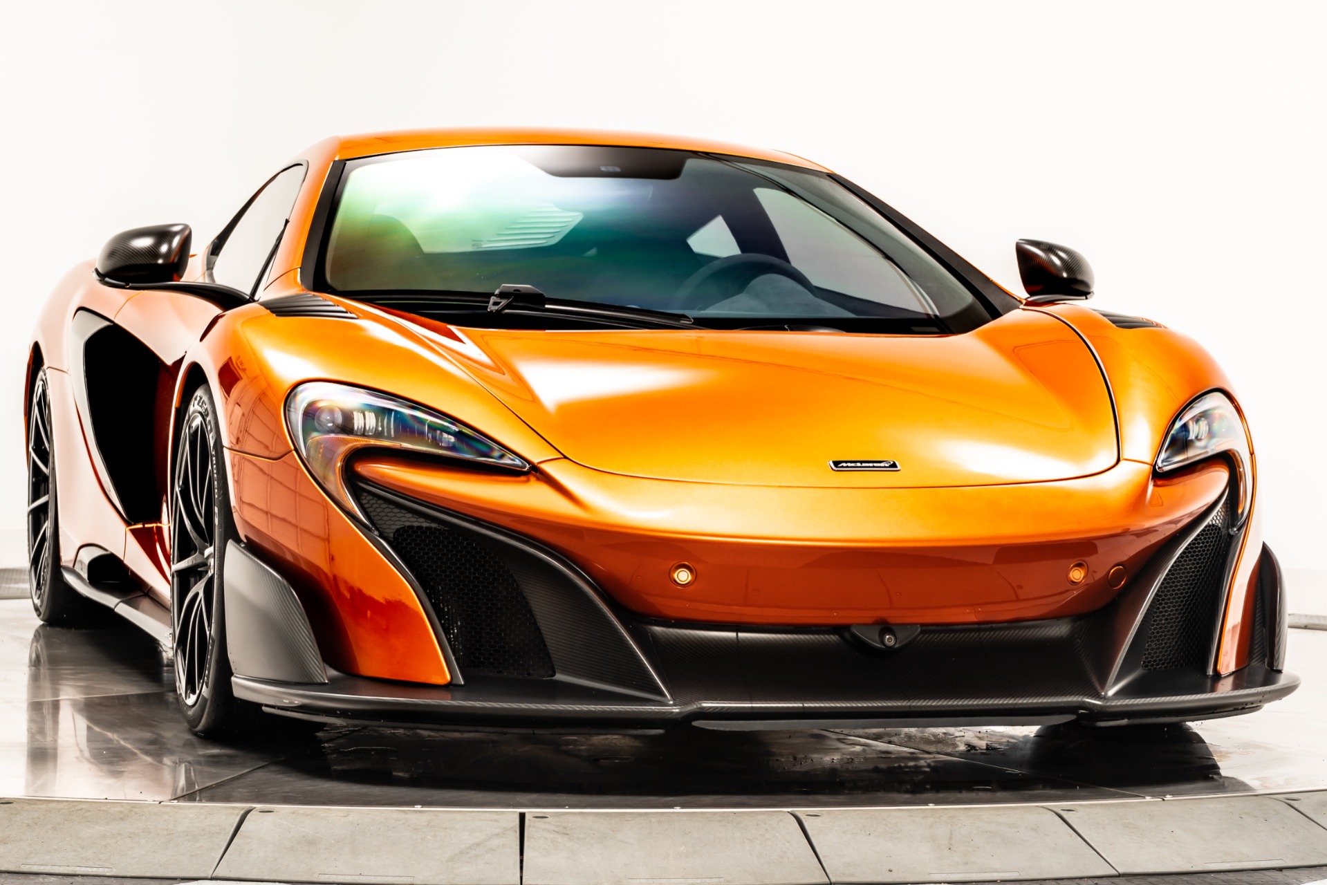 mclaren tobacco orange Helps Launch New Marlboro Citrus Cigarettes  DEMARAS RACING McLaren Unveiled Custom Singapore Grand