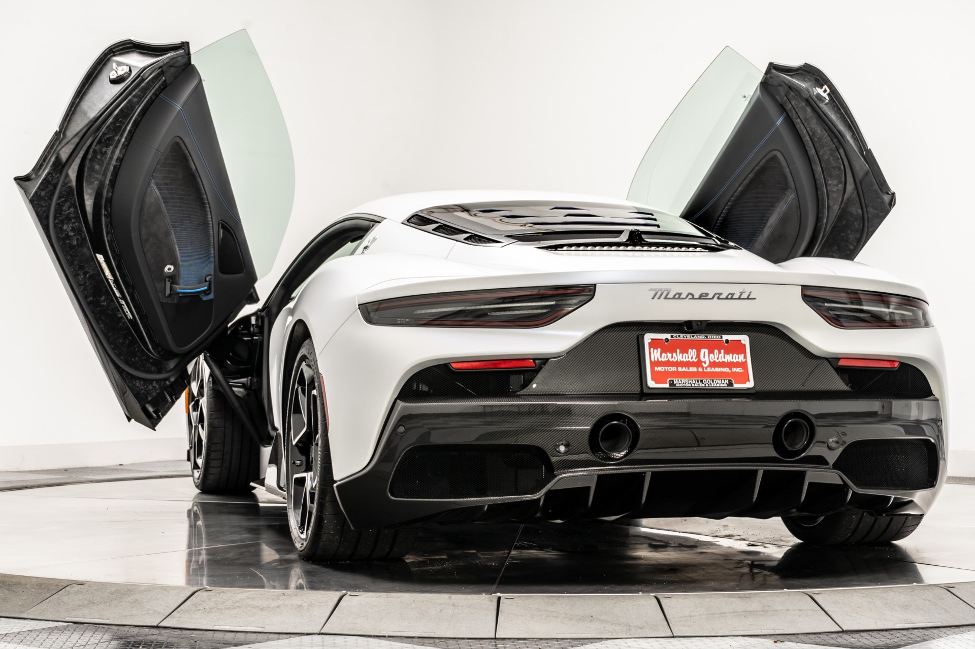 Bianco Audace matte Maserati MC20 with Nero/Blue Cielo Interior