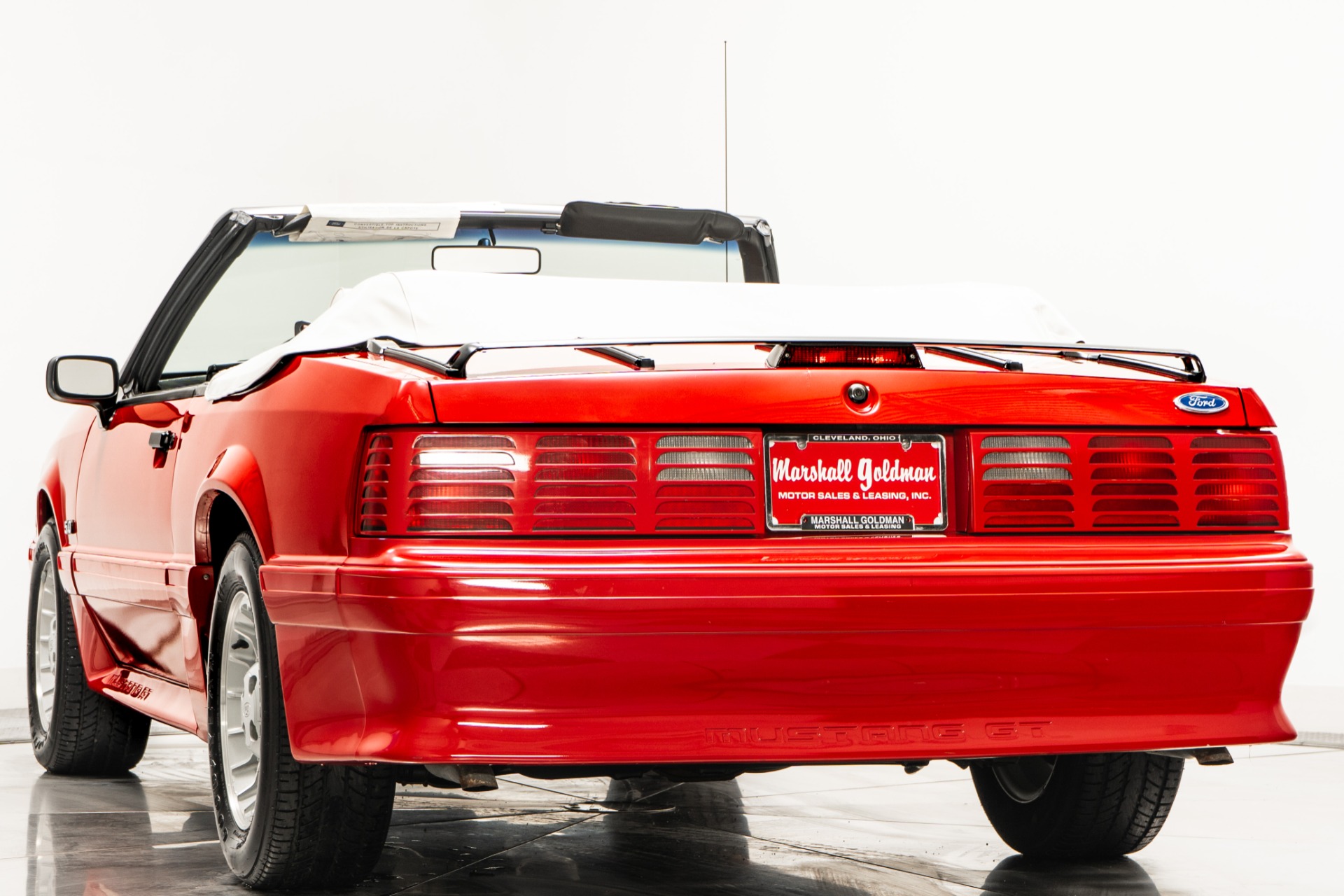 Bright Red Ford Mustang GT Convertible with White Interior For