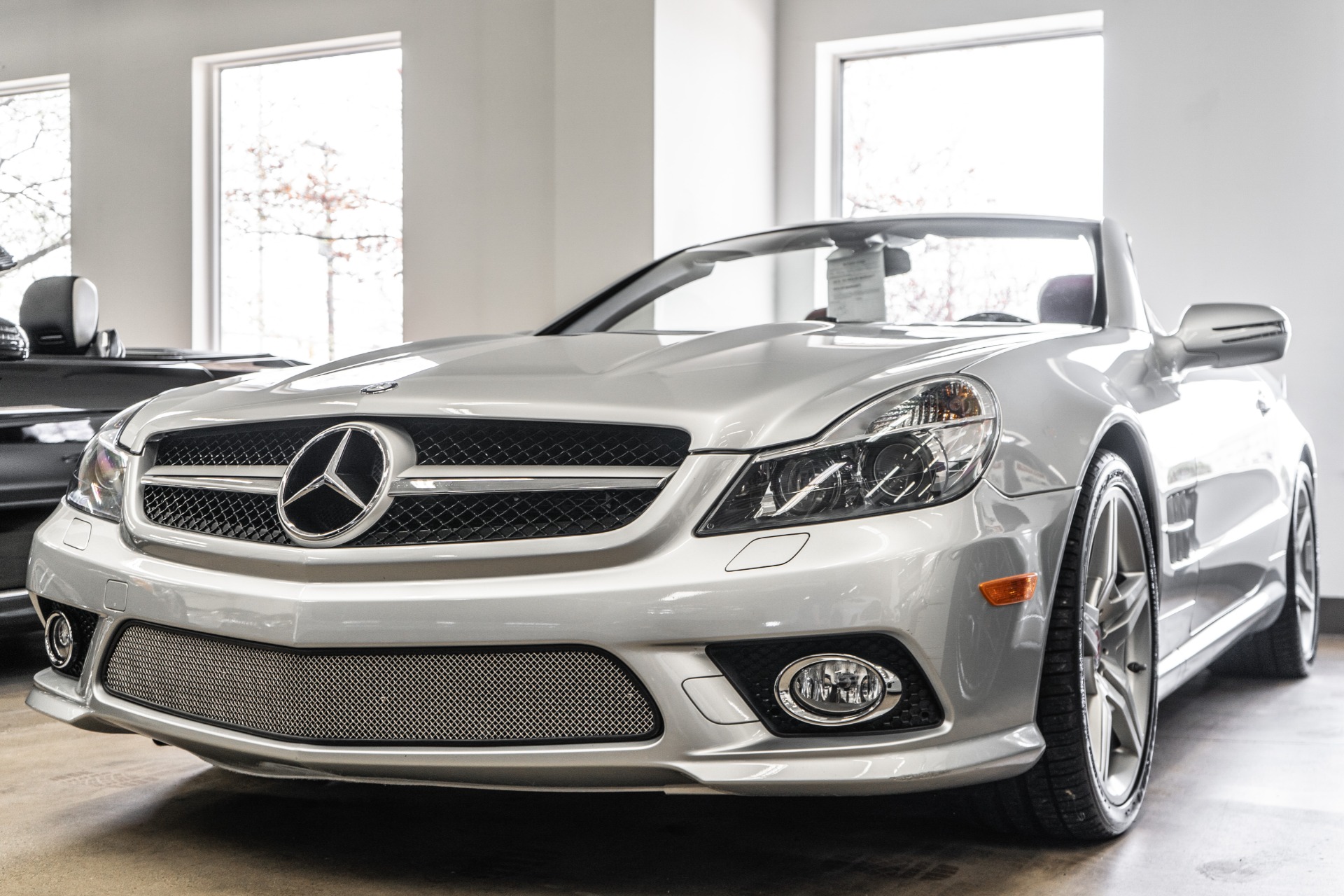 Iridium Silver Metallic Mercedes-Benz SL550 Roadster with Red