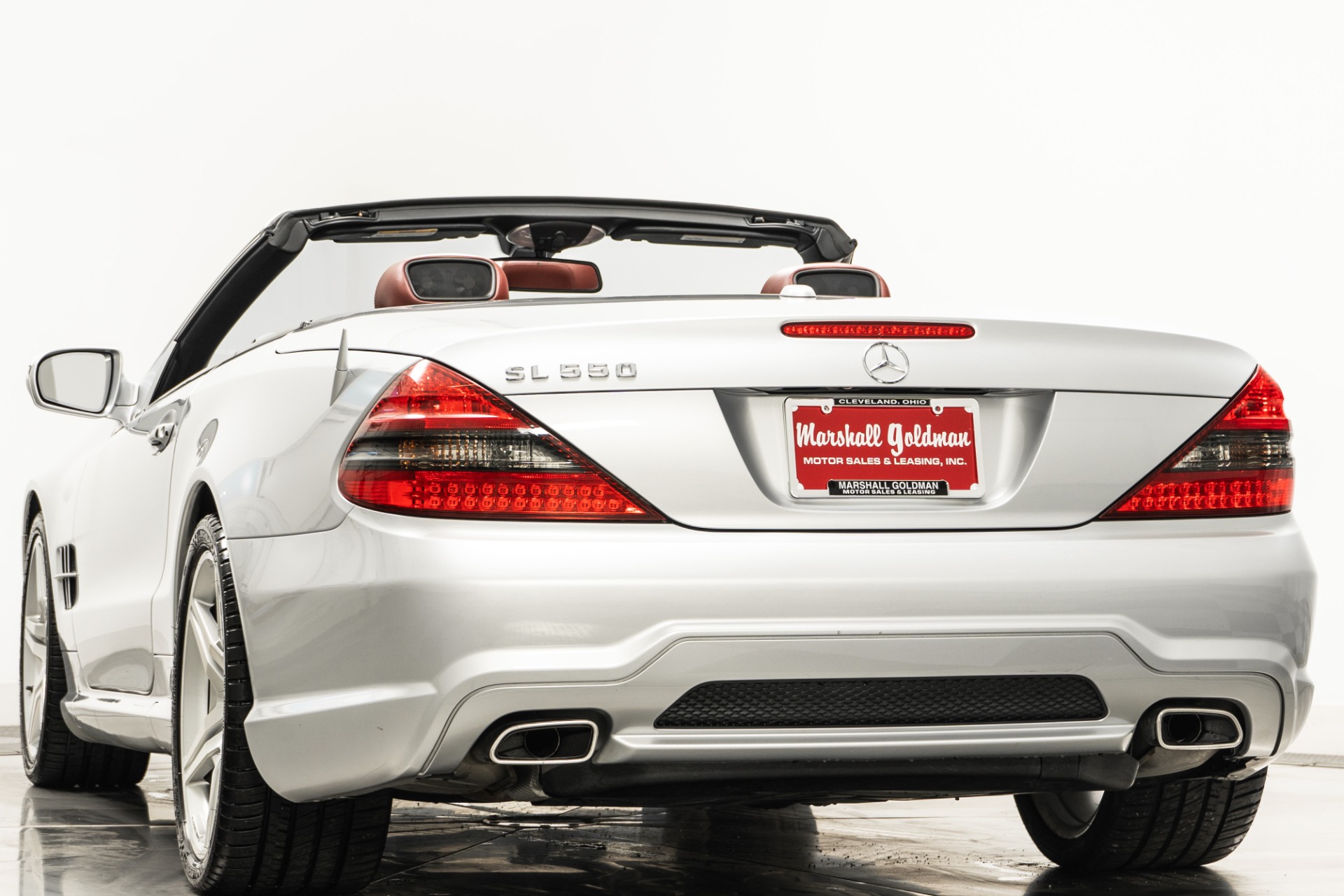 Iridium Silver Metallic Mercedes-Benz SL550 Roadster with Red