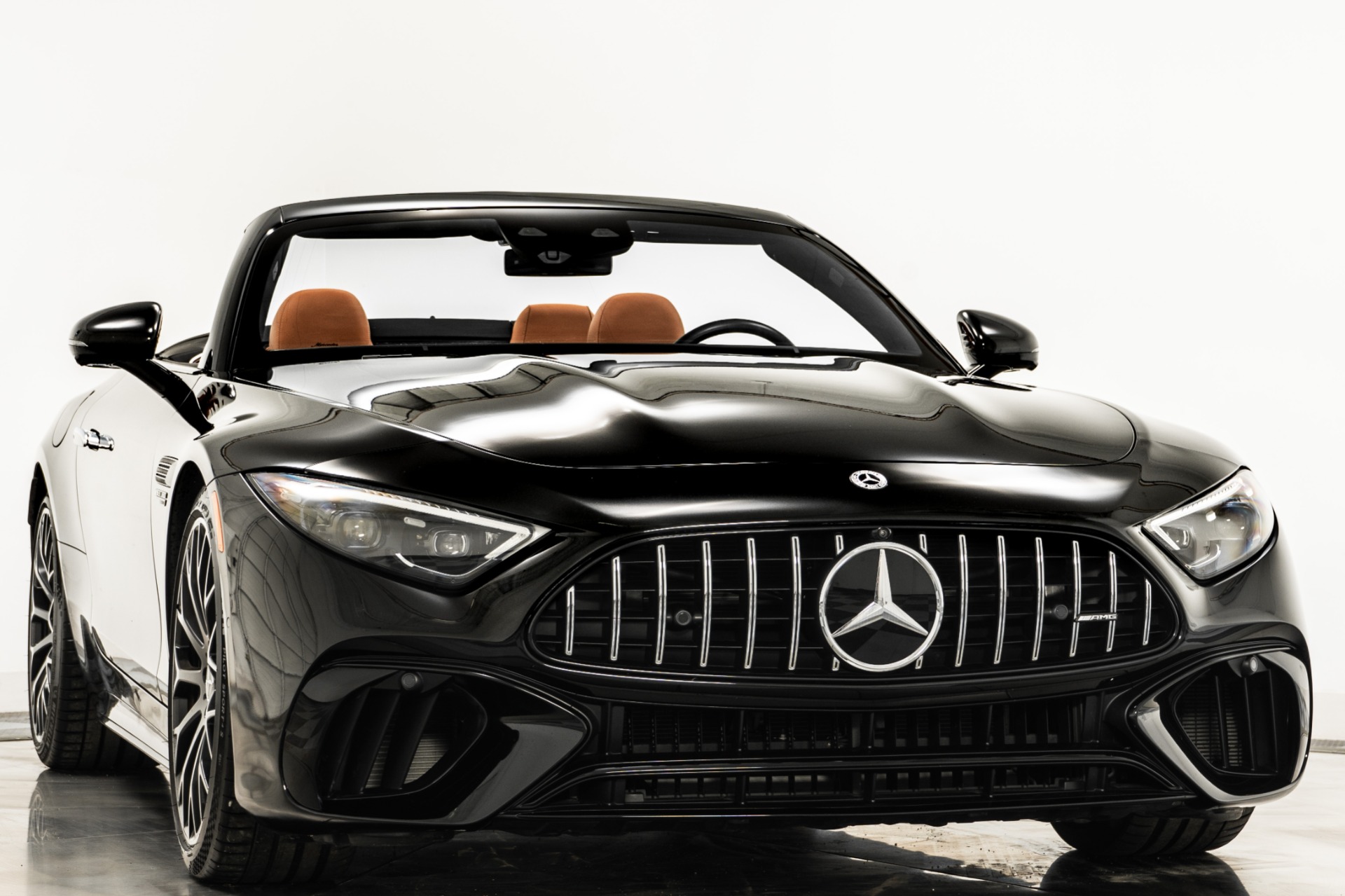 Obsidian Black Metallic Mercedes-Benz SL55 AMG with Sienna Brown