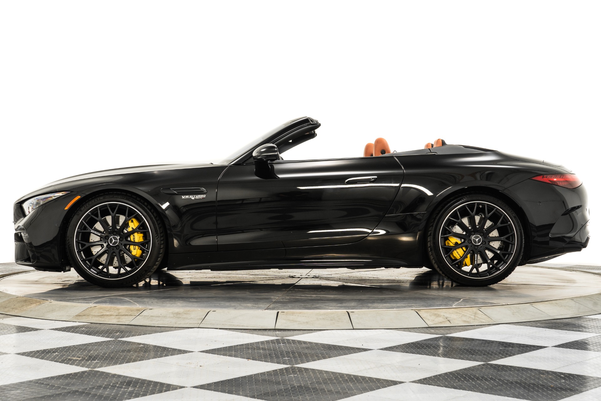 Obsidian Black Metallic Mercedes-Benz SL55 AMG with Sienna Brown