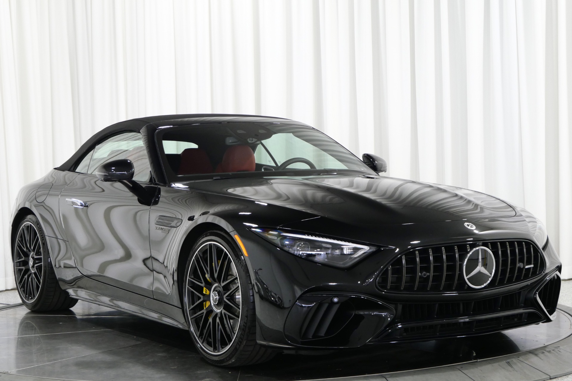 Obsidian Black Metallic Mercedes-Benz SL63 AMG with Red Pepper