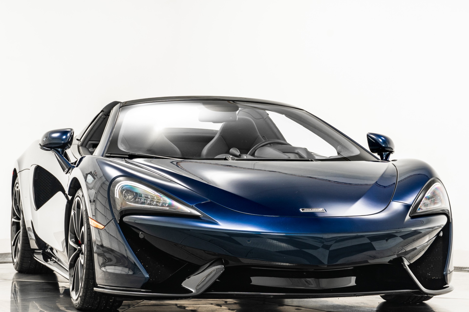 Namaka Blue McLaren 570S Roadster with Carbon Black Interior For