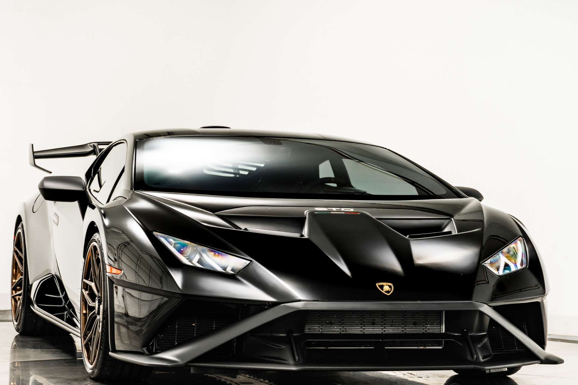 Nero Noctis Lamborghini Huracan STO with Nero Cosmus with Rosso