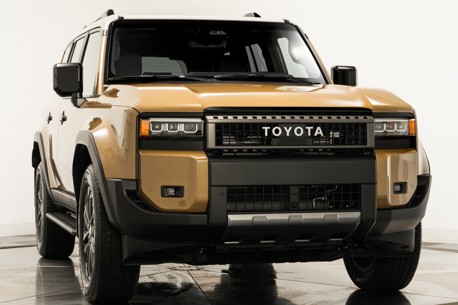 Trail Dust w/Grayscape Roof Toyota Land Cruiser with Black