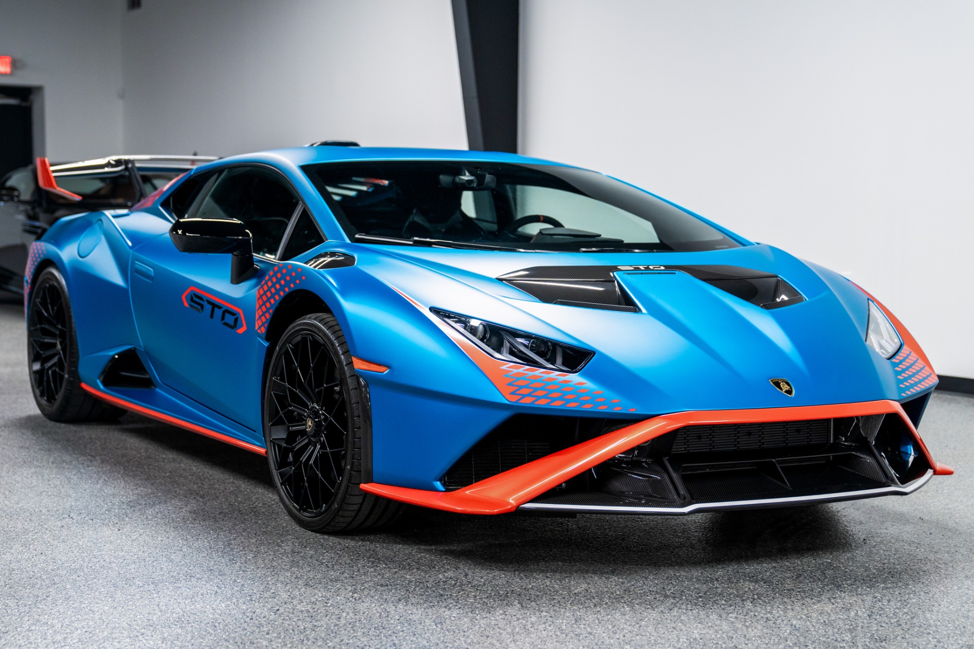 Blu Uranus Matt Lamborghini Huracan STO with Nero Cosmus with