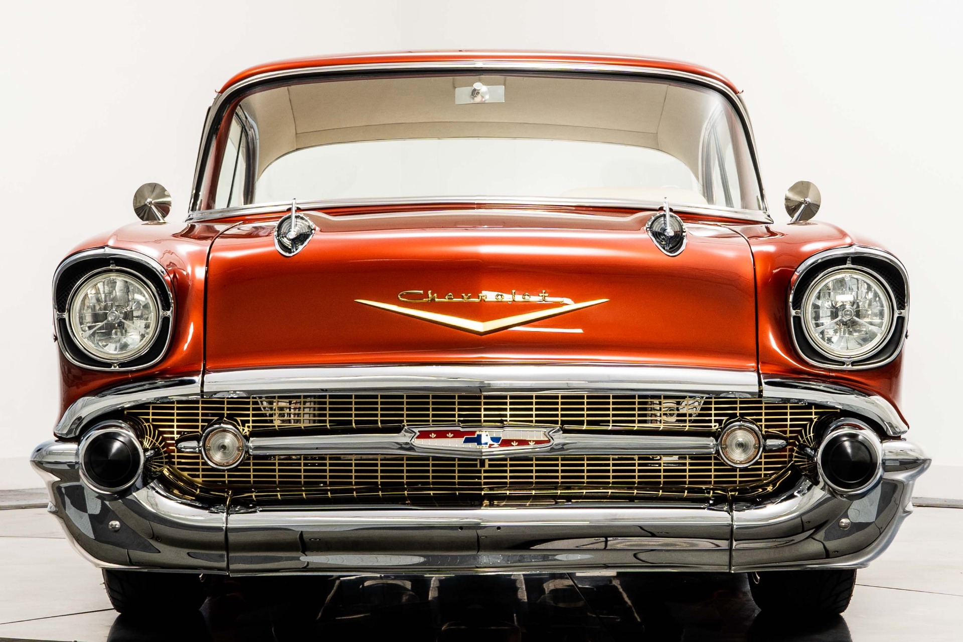 Sunset Pearlescent Orange Chevrolet Bel Air with Bisque Interior