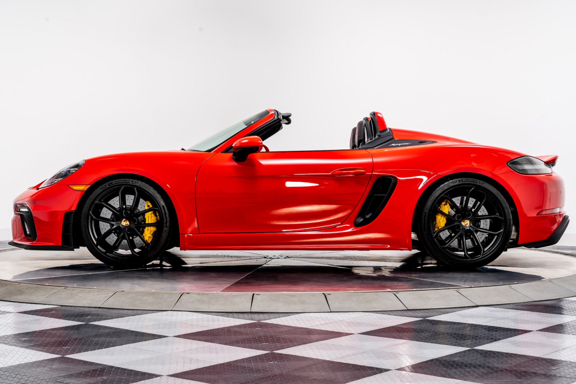 Guards Red Porsche 718 Boxster Spyder with Black w/ Red Stitching